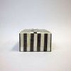 Back view showing vertical striped pattern of the closed box with row of stitches on top edge