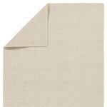 Top view showing rug corner folded to reveal ribbed texture on the backside