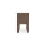 Back view of Sally Dining Chair with fully upholstered solid back and open space below seat