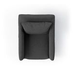 Top-down view of chair showing slightly wider armrest curvature and fuller cushion forms