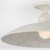 Chalice-shaped flush mount ceiling light with rustic limewash plaster finish and exposed G25 bulb