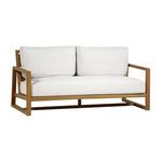 Avondale Natural N-dura Loveseat with light wood frame and white cushions designed for outdoor use