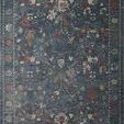 Long rectangular rug with a blue denim background featuring classic floral motifs in muted red, beige, and mustard