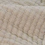 Close-up detail of Vancouver Coverlet’s soft cotton fabric highlighting quilted stitching pattern and texture