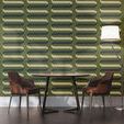 Wallpaper applied on a dining room wall with two brown chairs, round table, and standing lamp in natural light
