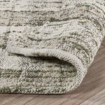 Corner fold highlighting soft wool pile and woven backing detail
