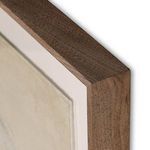 Close-up of the walnut wood frame's corner highlighting its texture and finish