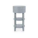 Back view highlighting the continuous washed lacquered linen texture on Claudette round side table