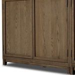 Interior view of open wood drawer with dovetail joints in double cabinet