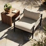Close side angle showing luminescent outdoor fabric texture and frame joinery