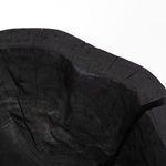 Close-up of rim edge texture on smaller bowl emphasizing soft natural curves