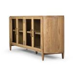 Another angled view of sideboard doors open with visible interior shelves and cable holes