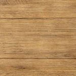 Close-up of wood grain texture on the table’s top surface with natural distress marks