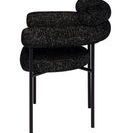 Side view highlighting tubular backrest and armrest design with metal frame of Portia dining chair