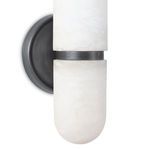 Close-up of bottom alabaster globe with soft veining next to round oil rubbed bronze wall mount