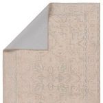 Back side of Josephine Medallion rug showing solid grey underside with folded corner