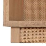Detailed view of rattan panel texture intersecting with natural wood frame at edges