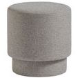 Round Reyes Ottoman in light textured gray upholstery with a tiered, cylindrical silhouette