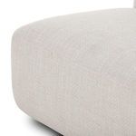 Close-up of thick cushion edge on chaise showing fabric weave and rounded corners