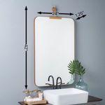 Mirror above sink with dimensions overlay showing 42 inches tall and 24 inches wide with 1.25-inch depth
