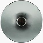 Top-down view showing the smooth round glass surface and circular iron base center of Delfin End Table