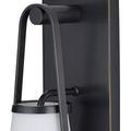 Close-up side angle showing metal handle curving from wall plate to shade rim