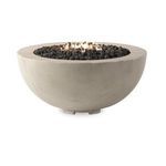 Fire table with flames burning among black lava stones in the center bowl, against a plain white background