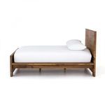 Side view of bed showing low profile frame and striking headboard grain
