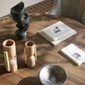 Lubo Breccia bowl on wooden round table with modern art sculpture, books, and textured decorative vases