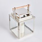 Outdoor lantern with single white candle inside on plain white background
