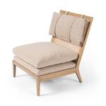 Kenzo Chair angled view showing slanted legs and cushion support straps on cane back