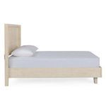 Side profile of Reece Bed highlighting angled legs and straight headboard in light mango wood