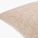 Close-up angled view showing textured fabric and soft filling of Mindy Sandstone Accent Pillow