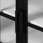 Top corner view of media console showing tight seam joints and black finish