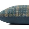 Side view of Earl pillow showing woven check front and smooth solid teal fabric back