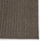 Zoomed close-up of thick, ribbed weave texture with visible fibers