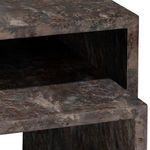 Close-up detail showing open nesting space between smaller and larger nesting tables
