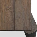 Close-up of natural wood knots and grain pattern on wide tabletop plank