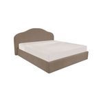 Maggie Bed angled view showing tapered silhouette and twisted trim detail on headboard