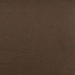 Close-up of brown linen fabric showing fine woven texture on bed slipcover