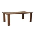 Outdoor dining table shown from a side angle highlighting the thick teak legs and tile surface