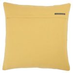 Solid mustard yellow back side of the pillow with small Jaipur Living brand tag on top edge