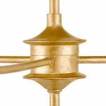 Detailed close-up of the central gold connector piece with a textured finish and arms extending horizontally