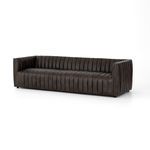 Deep brown top grain leather sofa with bold vertical channeling and a modern boxy silhouette