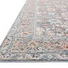 Low angle side view highlighting the rug's edge and color pattern