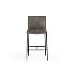 Front view of Mayer Stool showing vertical stitching on leather backrest and reinforced iron leg supports