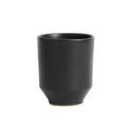 Black ceramic Ceto Cup with matte finish and subtle texture, tapered at base with natural tonal variation