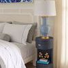 Aaron end table styled in bedroom with lamp and decor on shelf