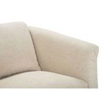 Upper armrest and back cushion showing fabric folds and stitching detail