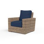 Havana Club Chair with rich Aged Tobacco all-weather wicker and navy blue cushions